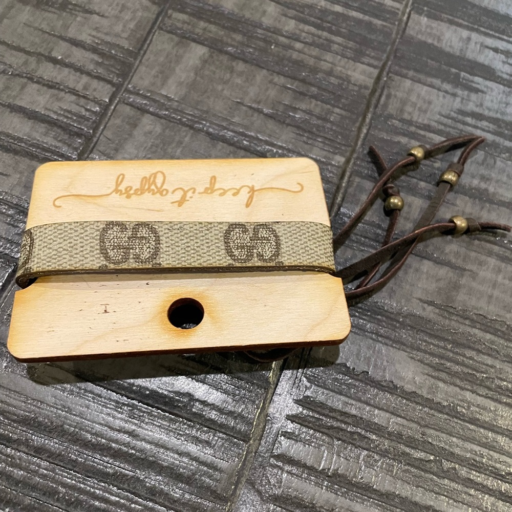 Seriously, cute upcycled Gucci leather bracelet.